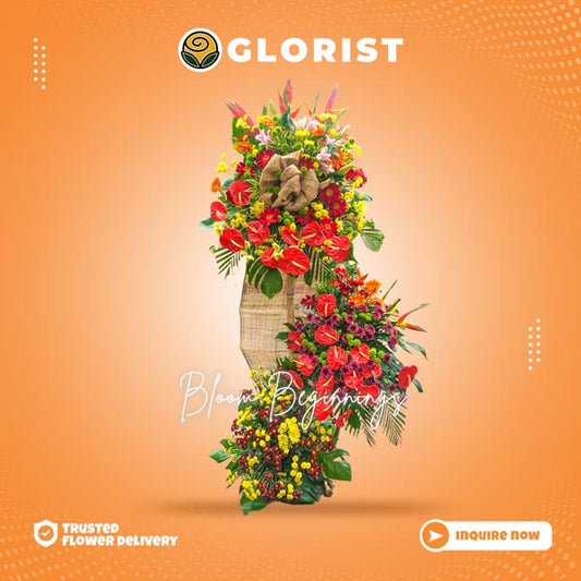 Inaugural flower stand with red anthurium, red and orange gerbera daisies, stargazer, bird-of-paradise, green and yellow buttons. Vibrant and elegant floral arrangement. Flower delivery near Bonifacio Global City (BGC), SM Mall of Asia, Trinoma, and Pinto Art Museum.