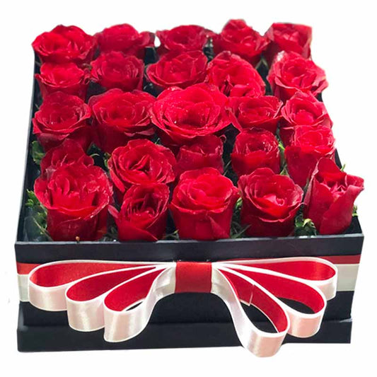 Box of 25 Red Roses with Satin Ribbon, a stunning floral arrangement for your special moments and celebrations. Order now and make a lasting impression.