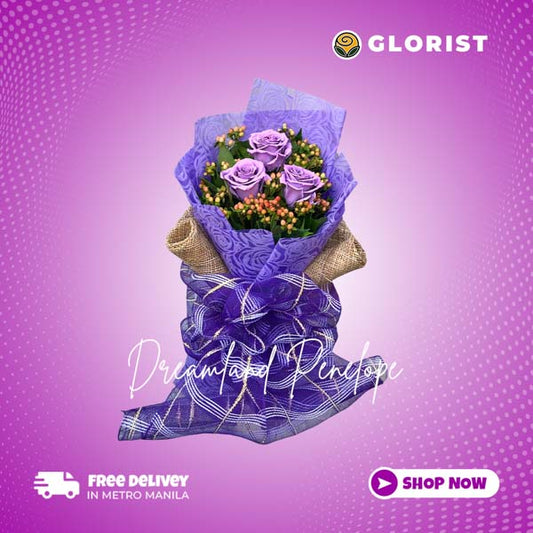 Three floral painted purple Ecuadorian roses with hypericum berries fillers in purple tissue and burlap wrap with purple net - elegant flower arrangement for special occasions - flower delivery in Doña Remedios Trinidad, Bulacan