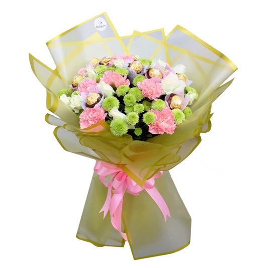 Elegant bouquet with 10 carnations, a dozen white roses, 10 Ferrero Rocher chocolates, and green button fillers in Korean-style wrap with satin ribbon - elegant flower arrangement for special occasions - flower delivery to Ortigas Center and The Podium