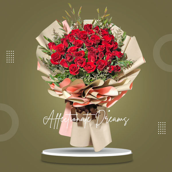 Affectionate Dreams: Elegant arrangement with 36 red roses and Misty Blue fillers for a romantic ambiance. Perfect for flower delivery in Metro Manila, Tagaytay, Rizal, Bulacan, and Laguna.