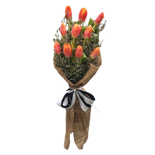 Vibrant bouquet: 10 orange tulips with misty blue fillers in burlap wrap with satin ribbon - perfect blend of color and texture - flower delivery to De La Salle University (DLSU) and Far Eastern University (FEU)