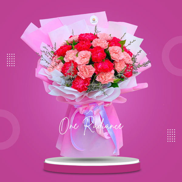 Stunning bouquet: light and dark pink carnations with misty blue fillers in Korean-style wrap with satin ribbon - elegant flower arrangement for special occasions - flower delivery to Pasay City Hall and Baclaran Church