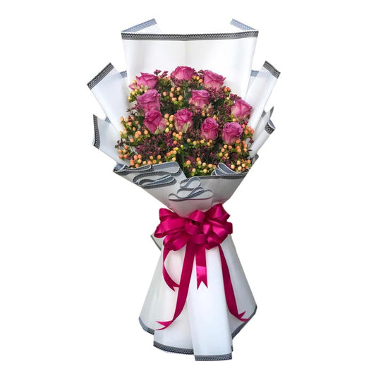 10 purple Ecuadorian roses with hypericum berries in Korean-style wrap with border design and satin ribbon - elegant flower arrangement for special occasions - flower delivery in Pulilan, Bulacan