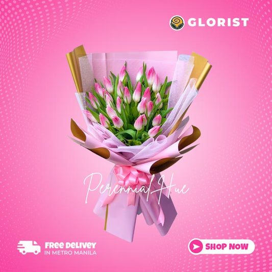 Gorgeous bouquet of two dozen pink tulips with statice fillers in tissue wrap with net - natural beauty and charm - flower delivery to Fort Santiago and Manila Cathedral