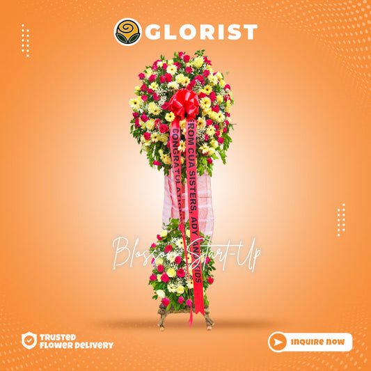 Inaugural flower stand with dark pink roses, yellow gerbera daisies, and gypsophila fillers. Vibrant and elegant floral arrangement. Flower delivery near Bonifacio Global City (BGC), Robinsons Place Manila, Enchanted Kingdom, and Daranak Falls.