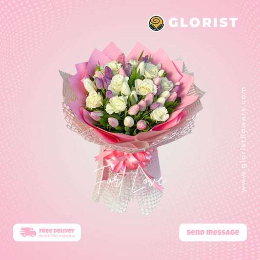 Captivating bouquet featuring 10 white roses, 10 white, pink, and purple tulips in light pink Korean wrap with satin ribbon - stunning flower arrangement for special occasions - flower delivery to Sta. Lucia East Grand Mall and SM City Baliwag